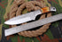 AW-010 "The Trail Boss" Handmade High-Carbon Steel Hunting & Survival Knife with Spine Serration and Bone Handle